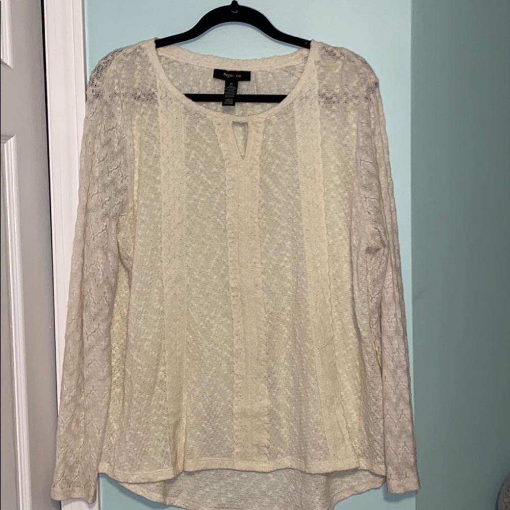 Cream colored long sleeve lace blouse